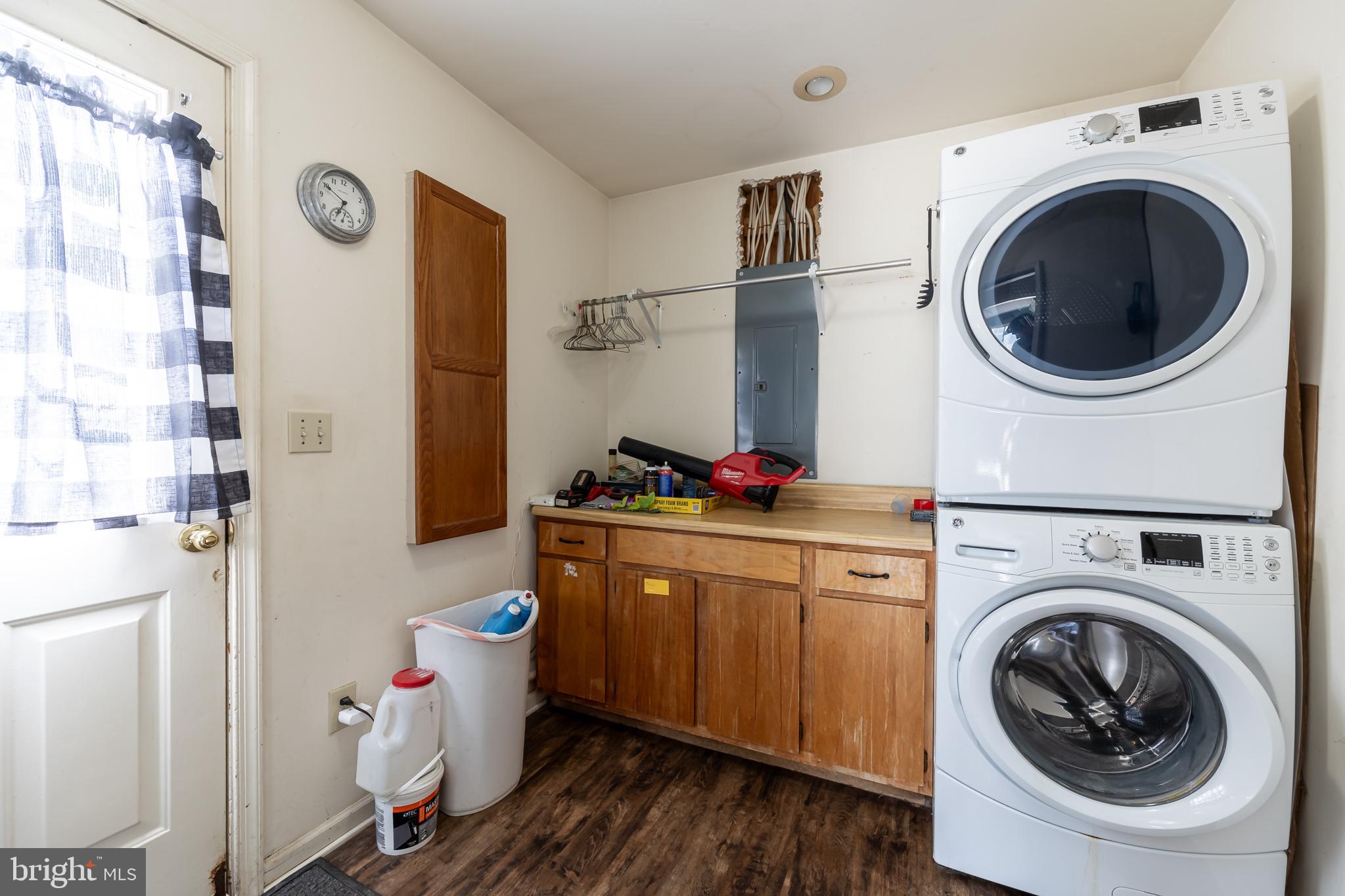 165 Brokenback Mountain Road Free Union, VA 22940 - Photo 27 of 71 a utility room with sink dryer and washer