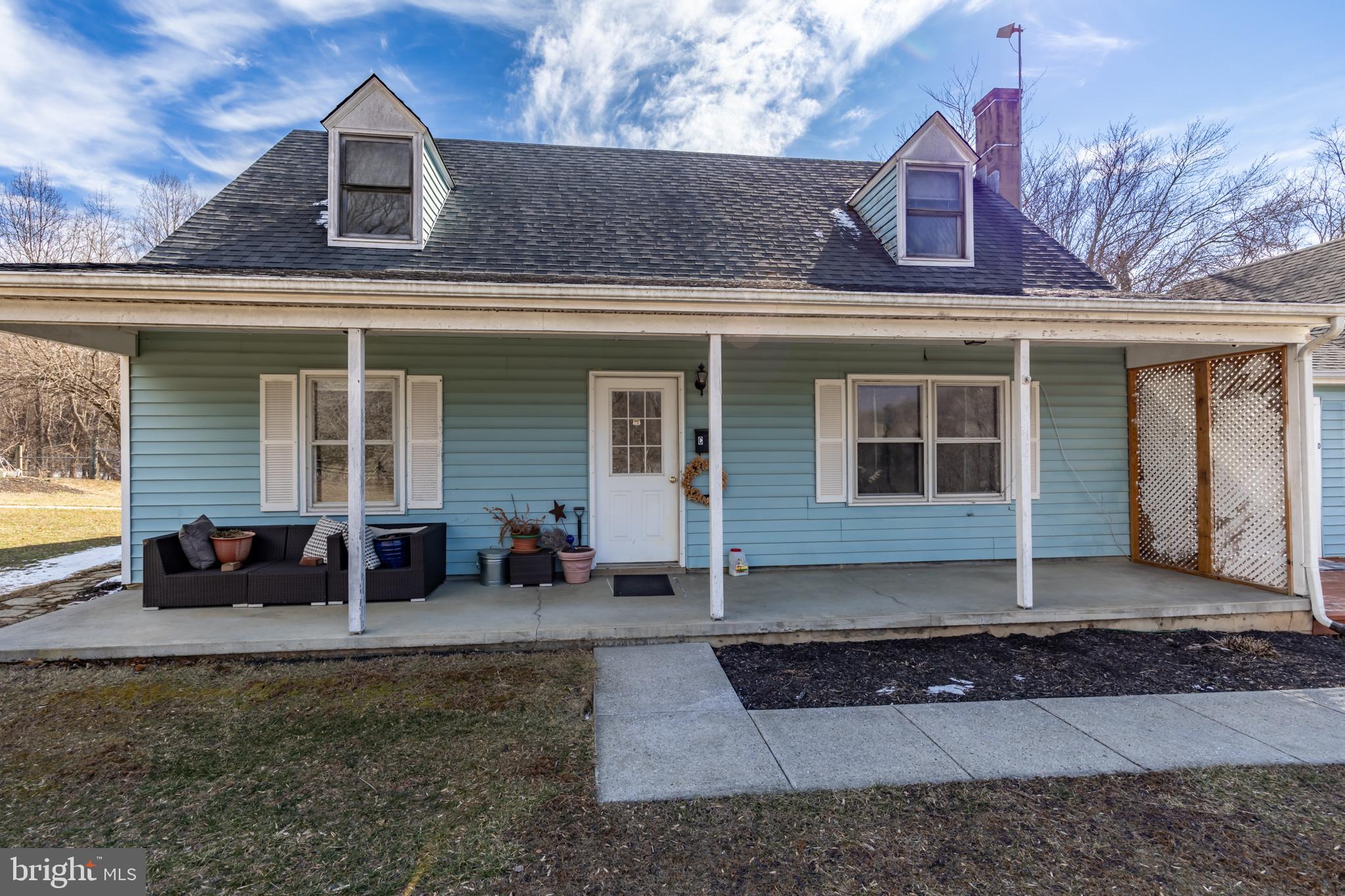 165 Brokenback Mountain Road Free Union, VA 22940 - Photo 40 of 71 a front view of a house with patio
