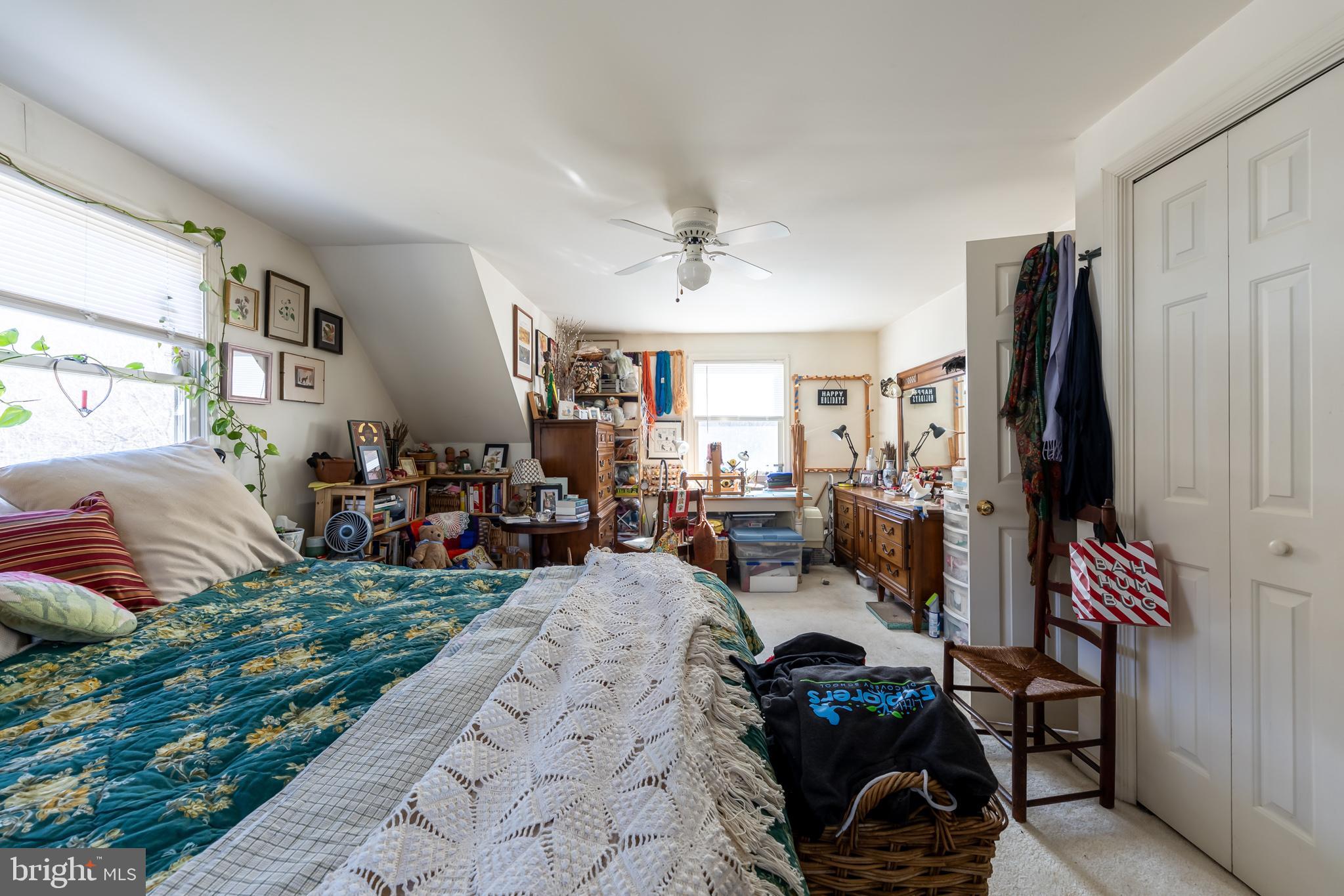 165 Brokenback Mountain Road Free Union, VA 22940 - Photo 43 of 71 a gym room with lots of furniture and a flat screen tv