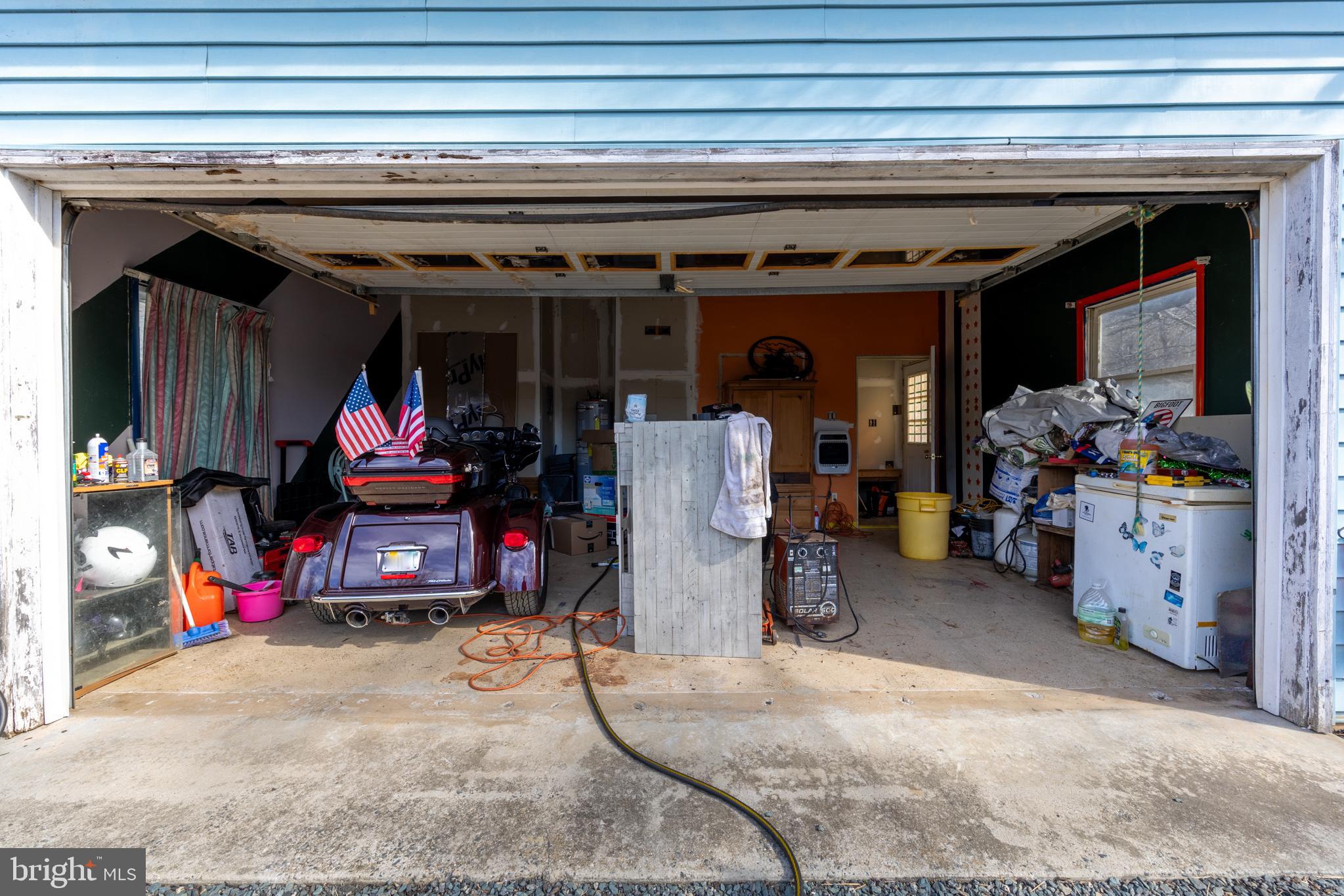 165 Brokenback Mountain Road Free Union, VA 22940 - Photo 5 of 71 a view of a storage room with a lot of stuff and furniture