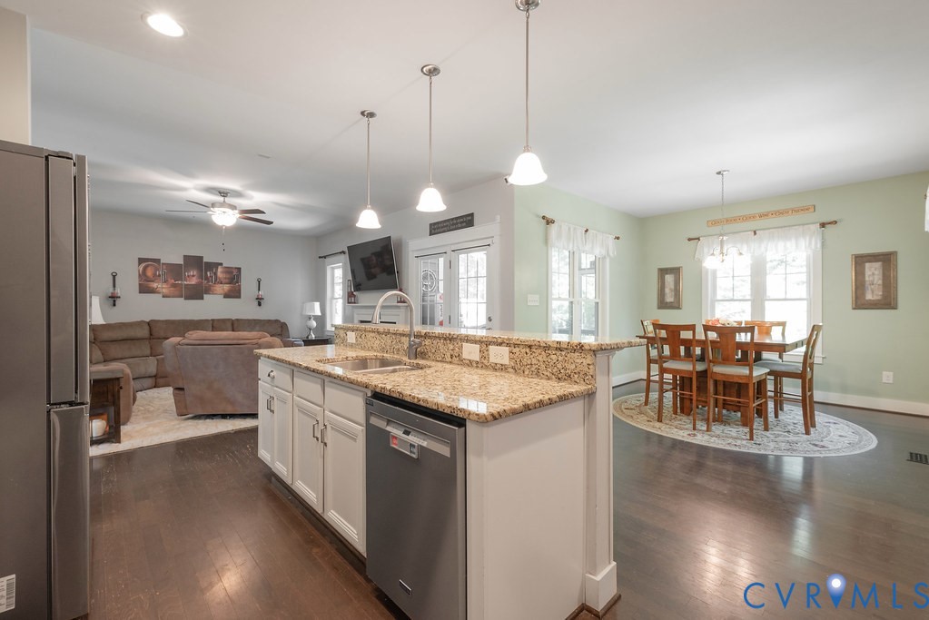 6446 Chestnut Church Road Mechanicsville, VA 23116 - Photo 12 of 49 Kitchen island with granite countertop, integrated