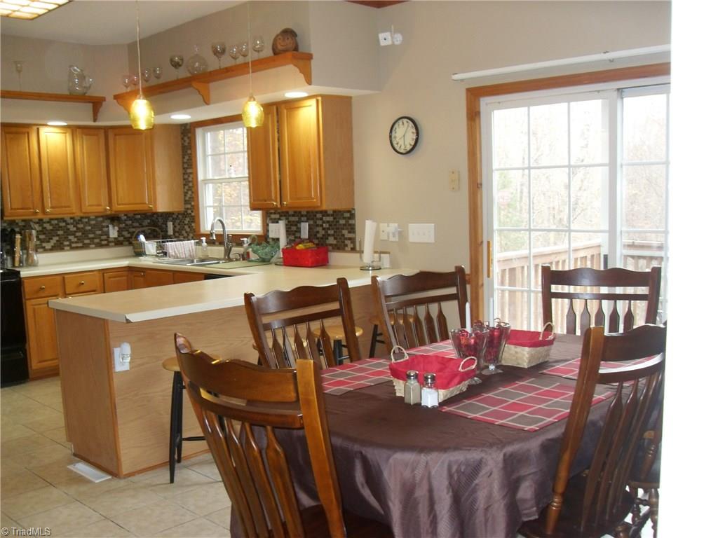 338 Fox Run View Lane Trinity, NC 27370 - Photo 4 of 21 Open kitchen and dinning area for family gatherings