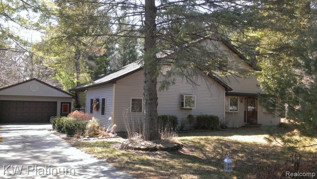 7230 Harrington Road Lexington, MI 48450 - Photo 2 of 46 Ext front full sun.jpg