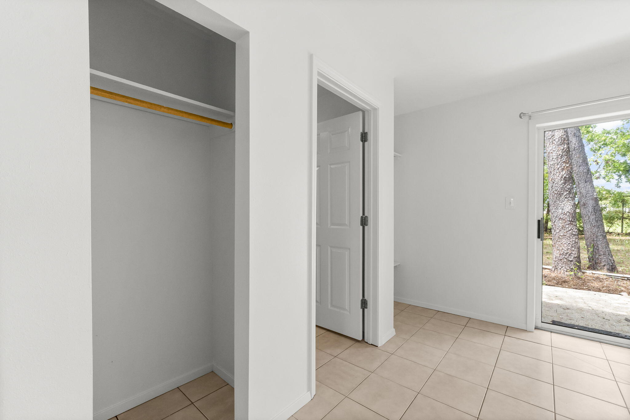 133 Sunrise Circle, Unit B Santa Rosa Beach, FL 32459 - Photo 12 of 25 a view of an empty room and a window