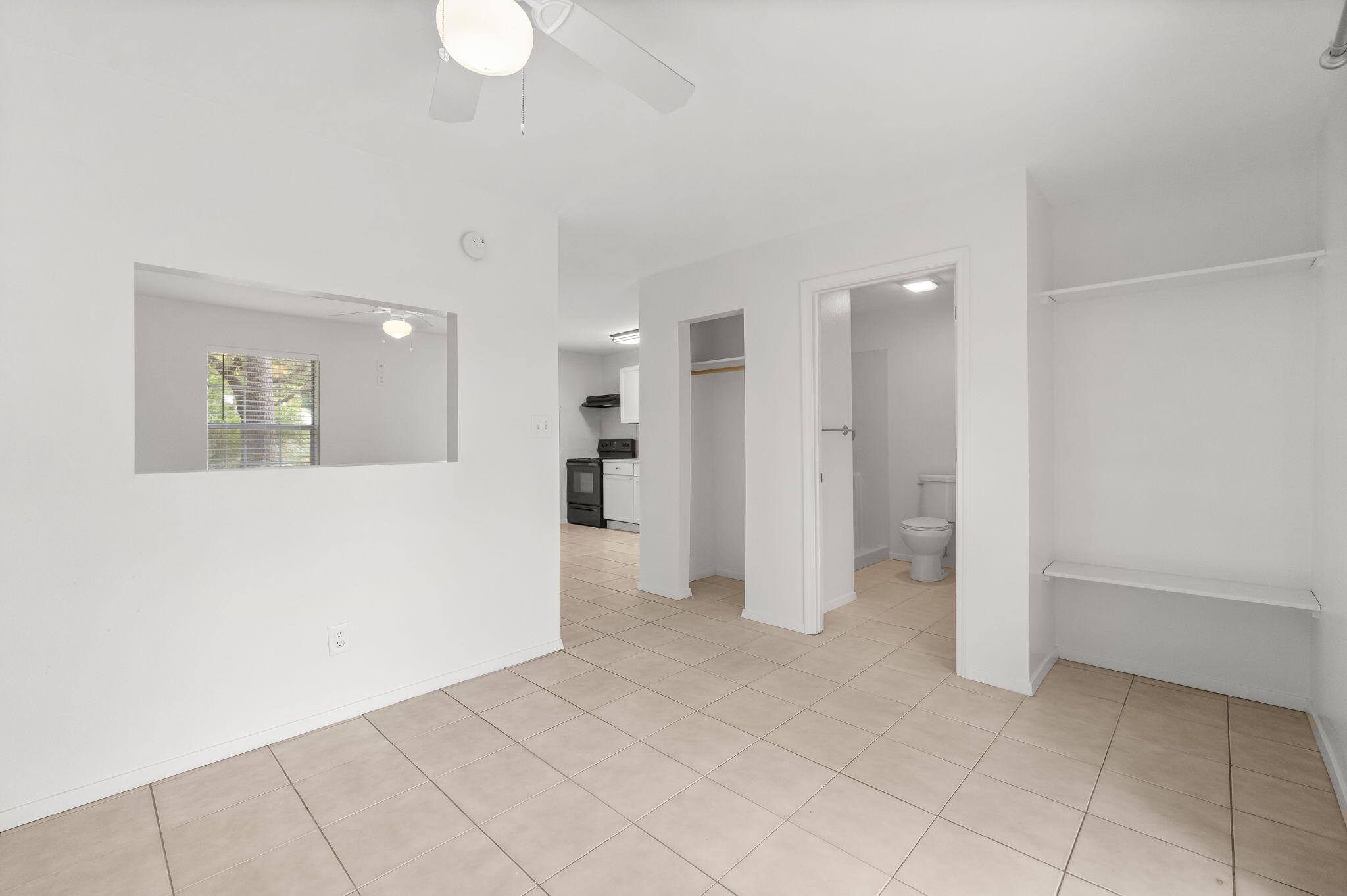 133 Sunrise Circle, Unit B Santa Rosa Beach, FL 32459 - Photo 13 of 25 an empty room with a bathroom and a bathroom