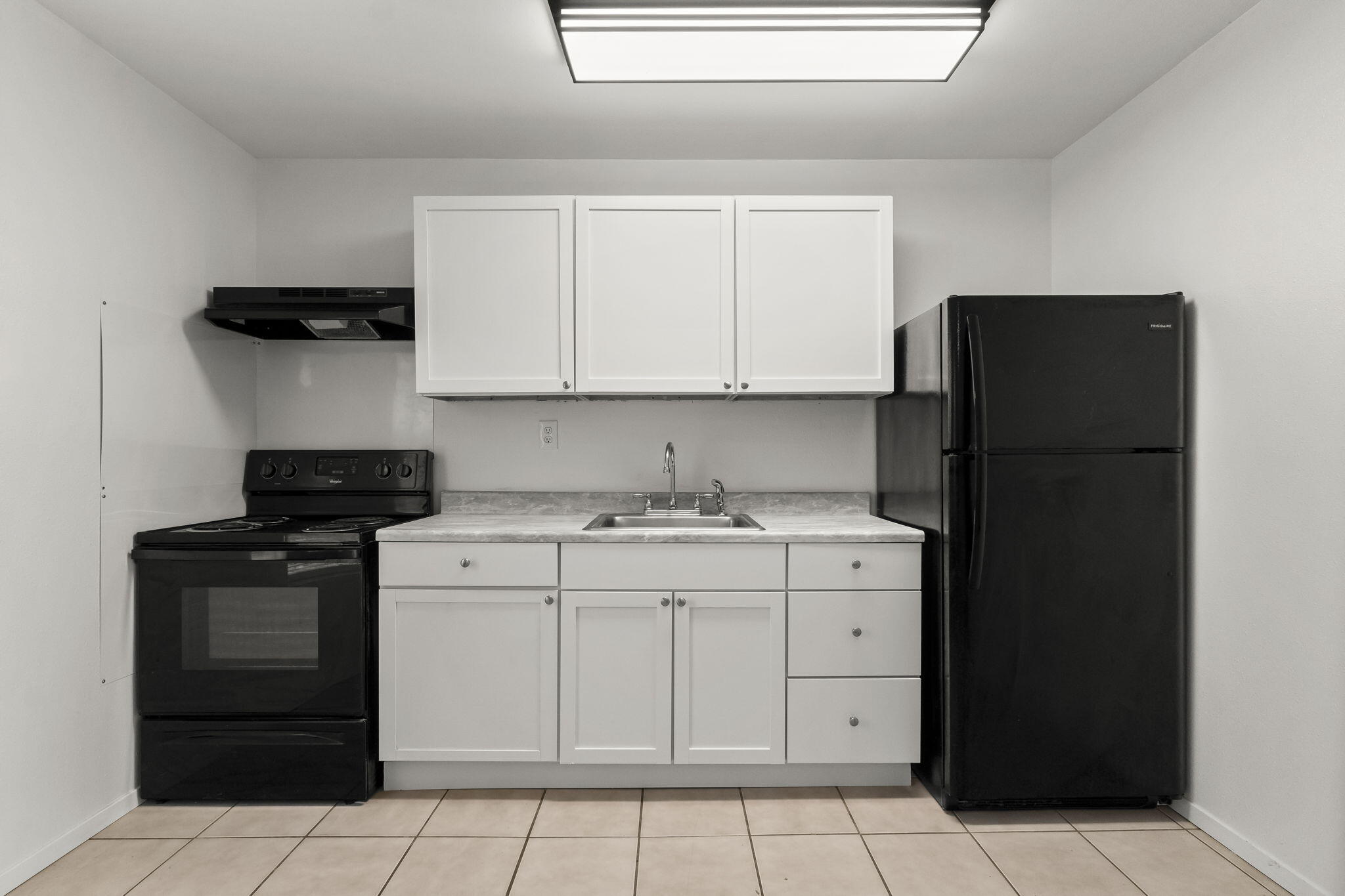 133 Sunrise Circle, Unit B Santa Rosa Beach, FL 32459 - Photo 9 of 25 a kitchen with a stove and a refrigerator