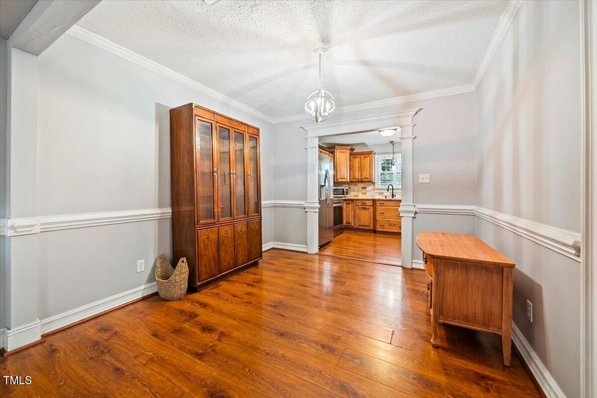 6397 New Market Way Raleigh, NC 27615 - Photo 11 of 28 dining room