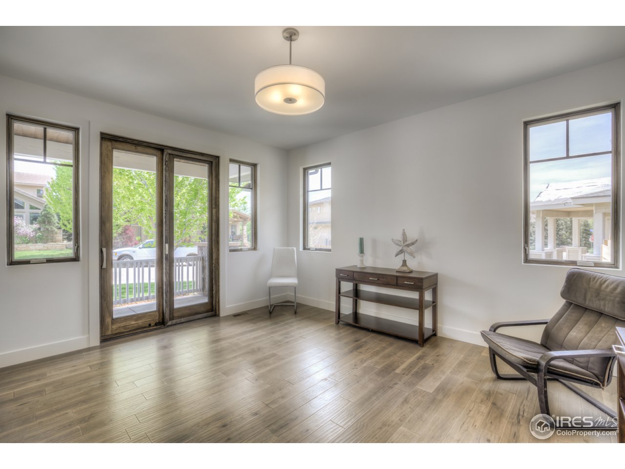 4845 6th Street Boulder, CO 80304 - Photo 11 of 25 a bedroom with furniture and windows