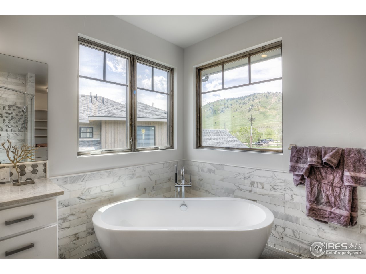 4845 6th Street Boulder, CO 80304 - Photo 15 of 25 a bathroom with a sink and a window
