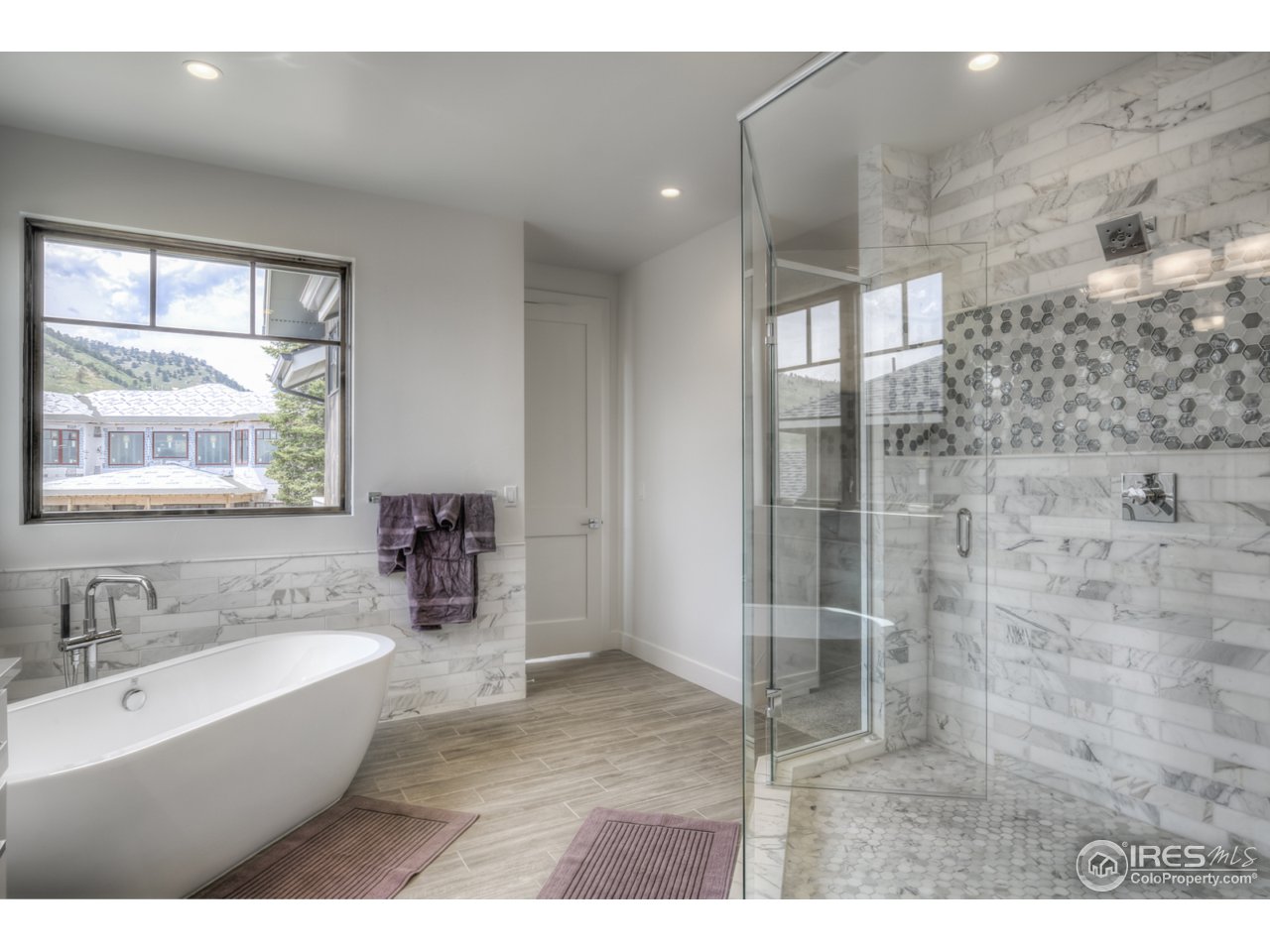 4845 6th Street Boulder, CO 80304 - Photo 16 of 25 a bathroom with a bathtub and a sink
