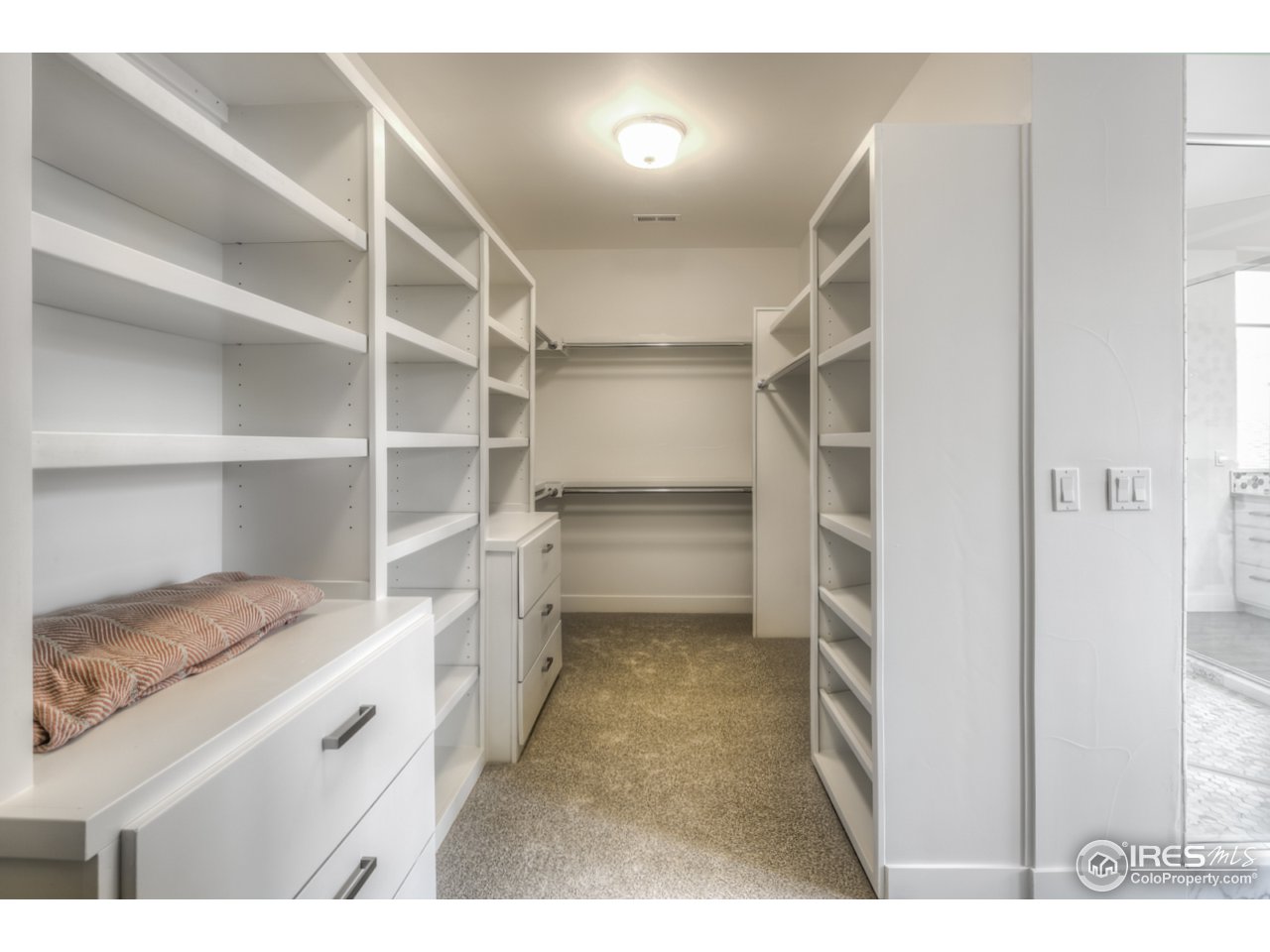 4845 6th Street Boulder, CO 80304 - Photo 17 of 25 a view of walk in closet with empty racks