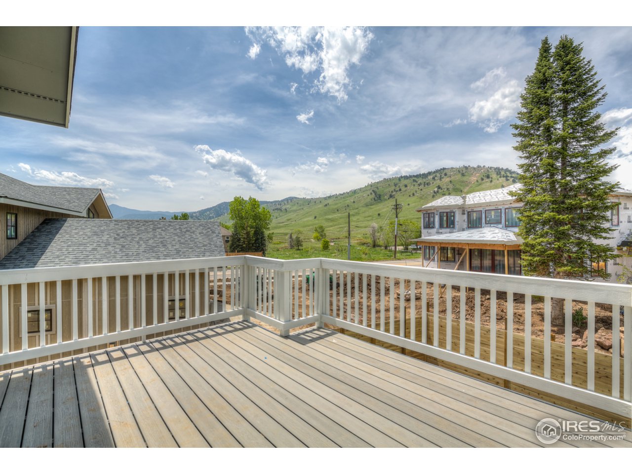 4845 6th Street Boulder, CO 80304 - Photo 18 of 25 a view of balcony with wooden floor and fence