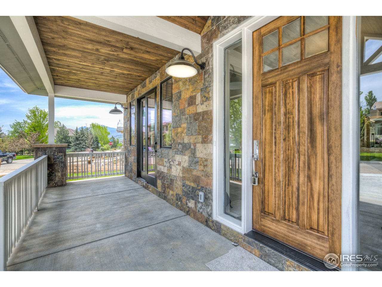4845 6th Street Boulder, CO 80304 - Photo 2 of 25 a view of a porch with wooden floor and outdoor space