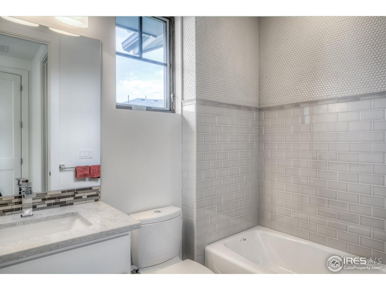 4845 6th Street Boulder, CO 80304 - Photo 21 of 25 a bathroom with a sink toilet and shower