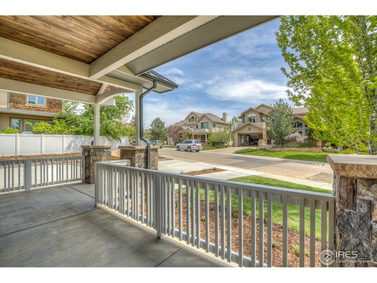 4845 6th Street Boulder, CO 80304 - Photo 4 of 25 a view of a pathway with a wrought fence