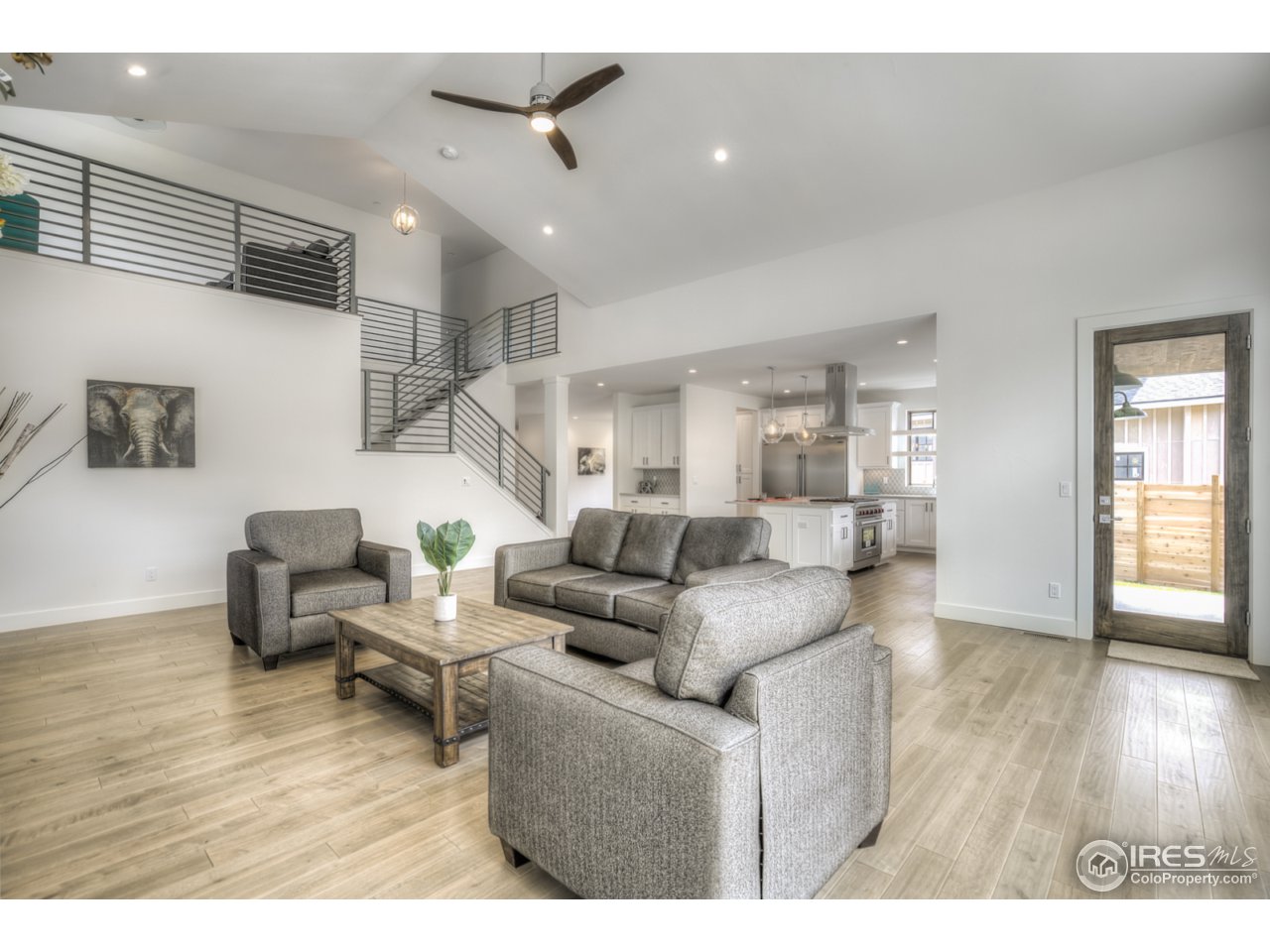 4845 6th Street Boulder, CO 80304 - Photo 5 of 25 a living room with furniture and wooden floor