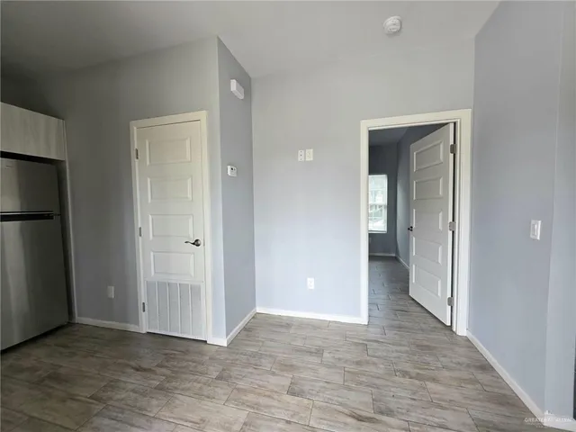 wooden floor and closet in a room