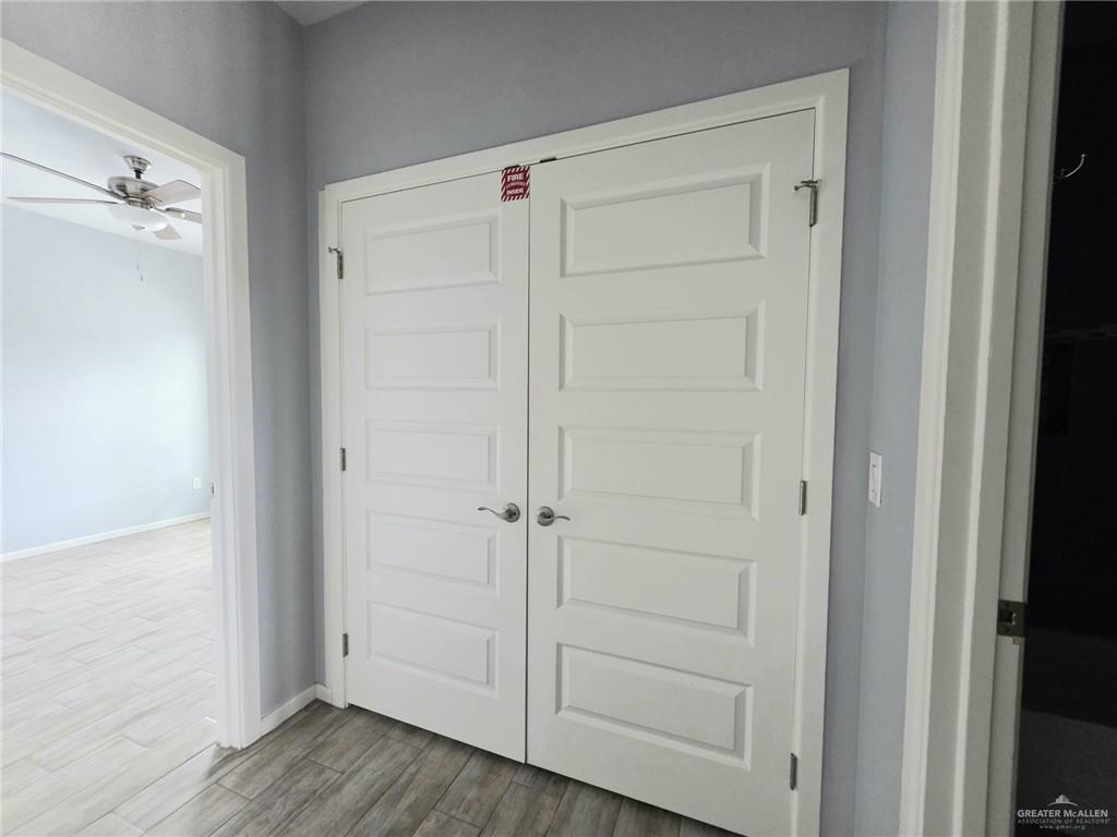 1514 Quitaca Drive, Unit 3 Edinburg, TX 78541 - Photo 9 of 10 an empty room with wooden floor