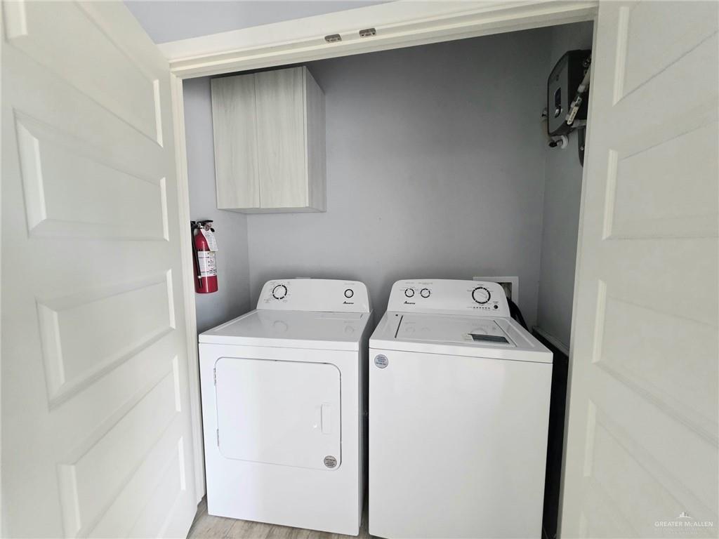 1514 Quitaca Drive, Unit 3 Edinburg, TX 78541 - Photo 10 of 10 a utility room with dryer and washer