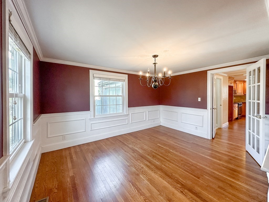 29 Douglas Road Needham, MA 02492 - Photo 17 of 42 wooden floor in an empty room with a window