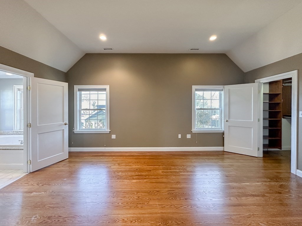 29 Douglas Road Needham, MA 02492 - Photo 18 of 42 an empty room with wooden floor and windows