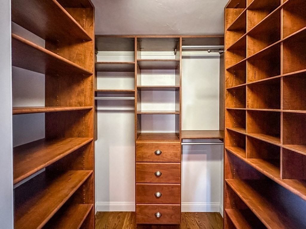 29 Douglas Road Needham, MA 02492 - Photo 21 of 42 a view of walk in closet with empty racks