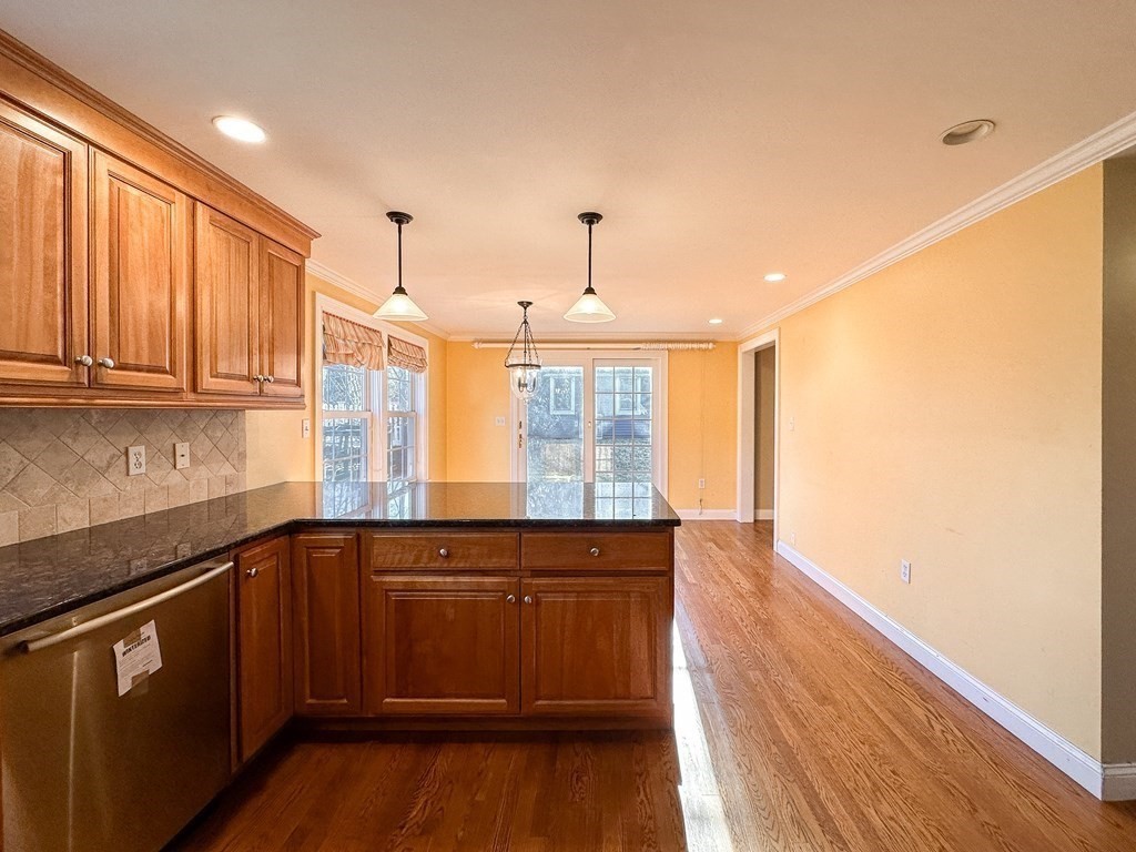 29 Douglas Road Needham, MA 02492 - Photo 3 of 42 a kitchen with a sink window and cabinets