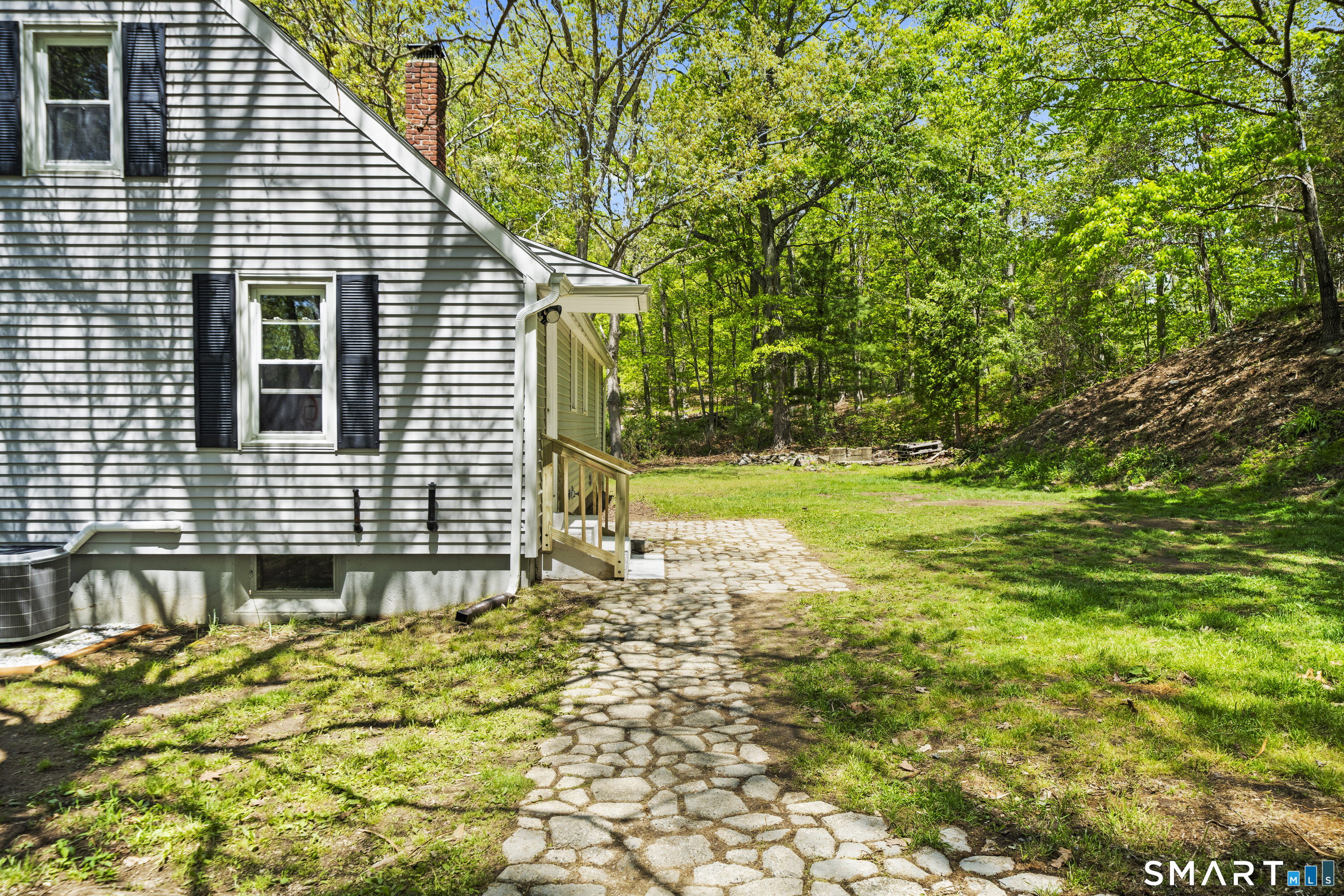 14 Church Street Sprague, CT 06330 - Photo 30 of 36 a view of a backyard with a garden