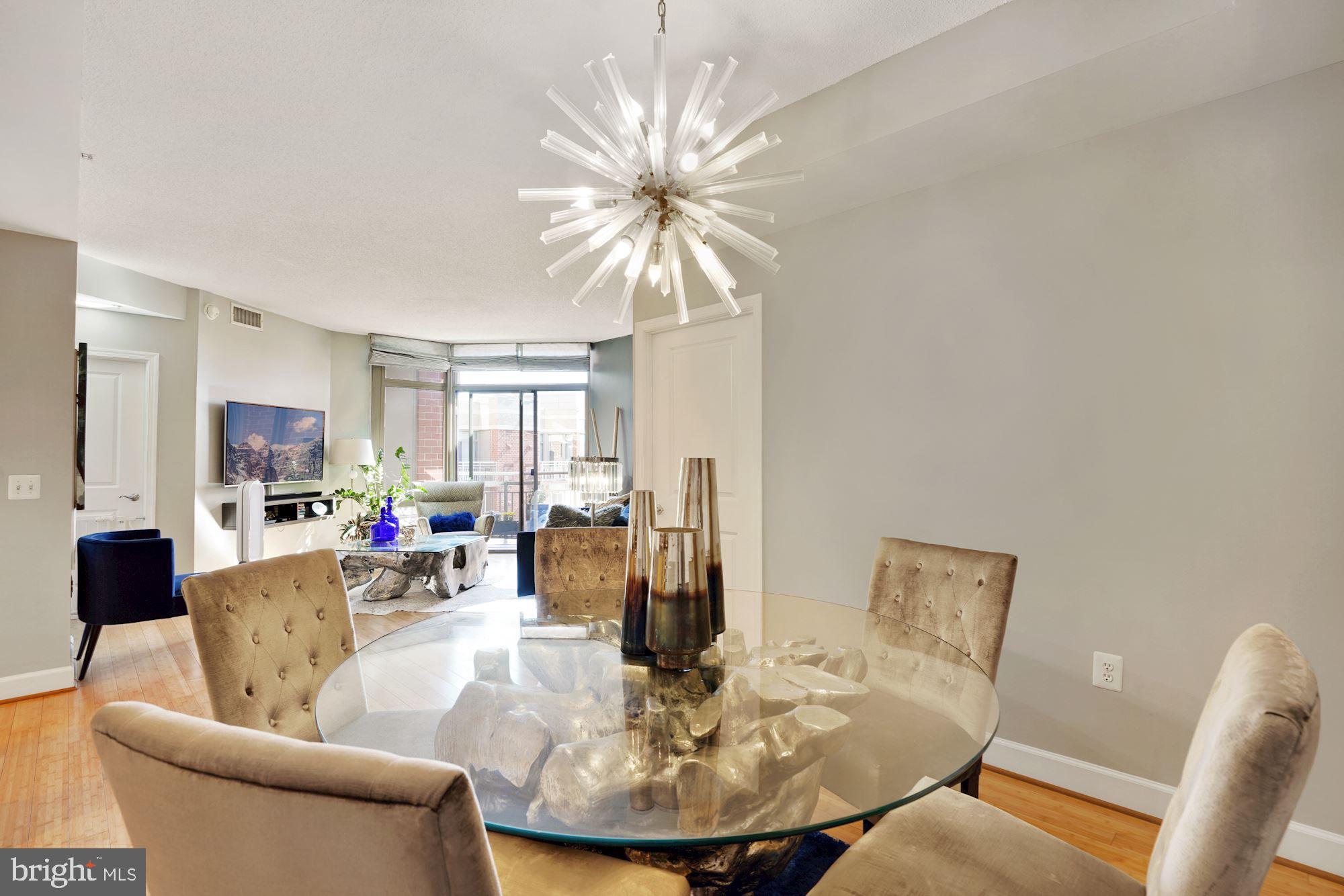 3600 South Glebe Road, Unit 632W Arlington, VA 22202 - Photo 13 of 41 a living room with furniture and a chandelier