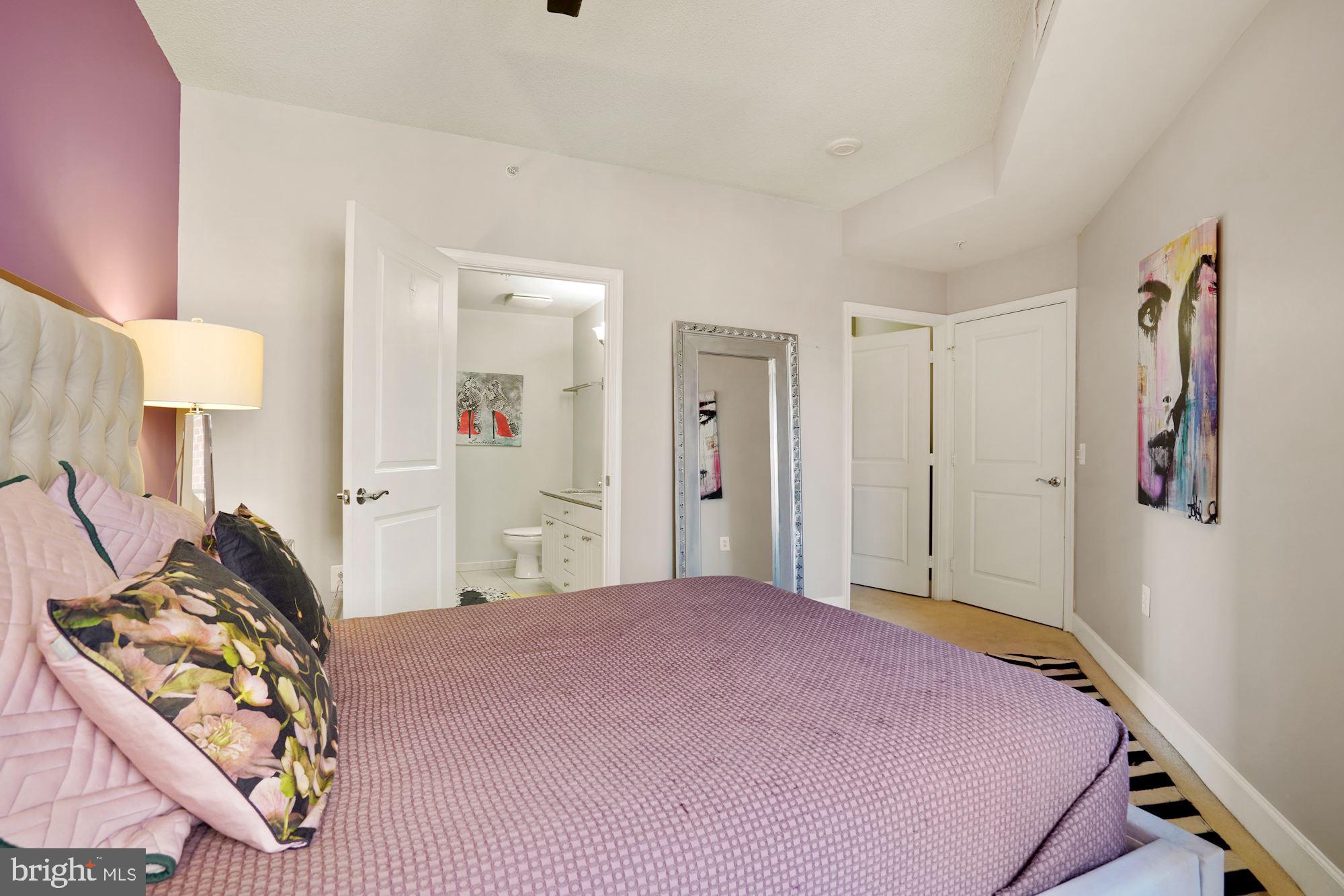 3600 South Glebe Road, Unit 632W Arlington, VA 22202 - Photo 19 of 41 a bedroom with a bed and a dresser