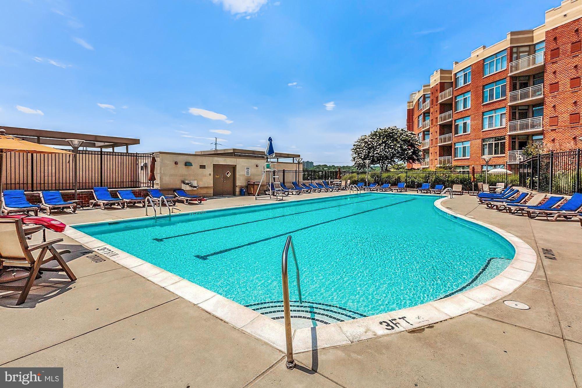 3600 South Glebe Road, Unit 632W Arlington, VA 22202 - Photo 39 of 41 a view of swimming pool with outdoor seating and yard