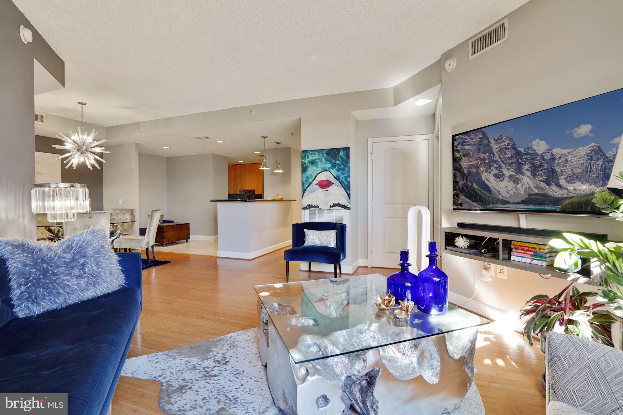 3600 South Glebe Road, Unit 632W Arlington, VA 22202 - Photo 4 of 41 a living room with furniture and a flat screen tv