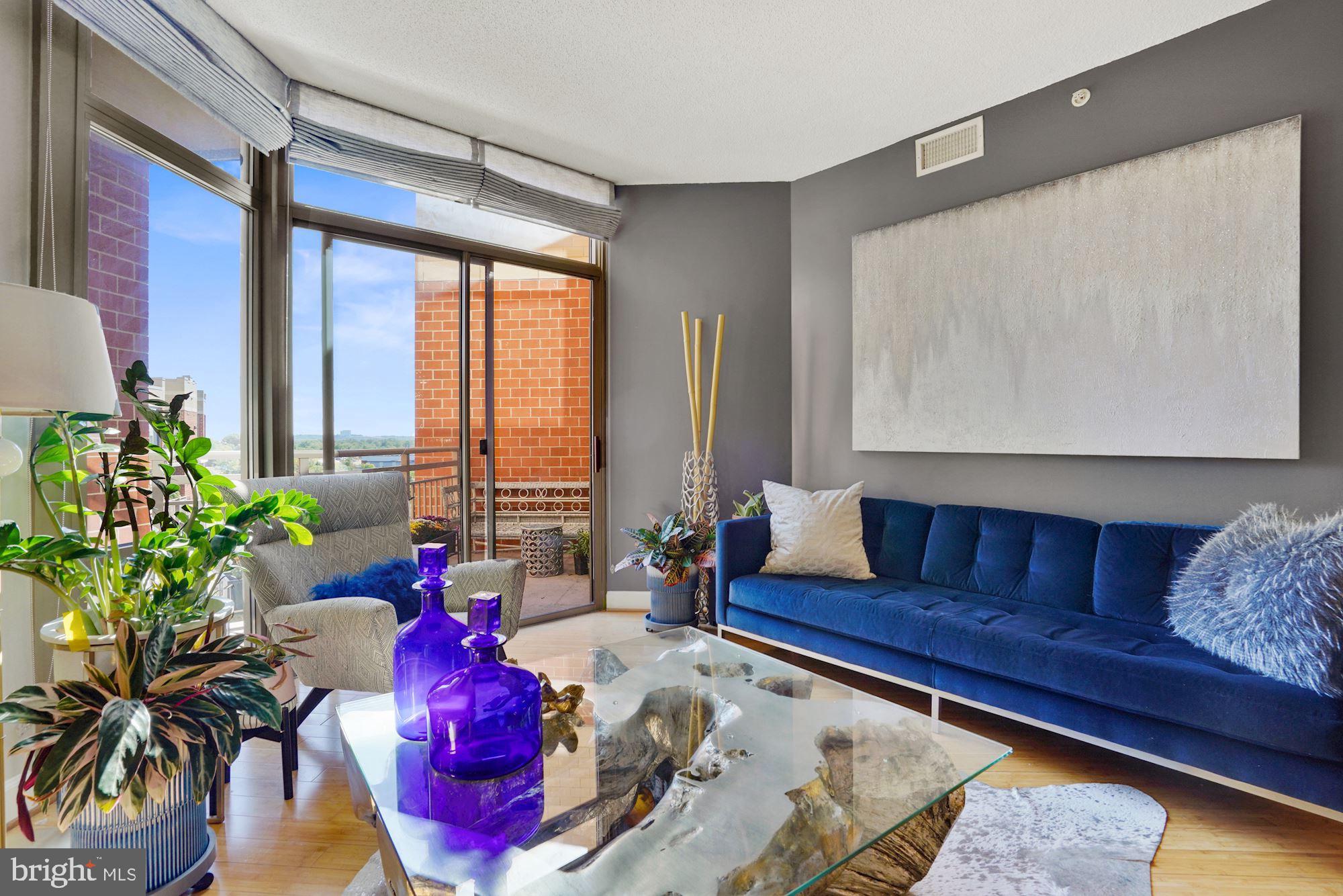3600 South Glebe Road, Unit 632W Arlington, VA 22202 - Photo 9 of 41 a living room with furniture and a potted plant