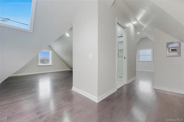 a view of livingroom with hardwood floor and hallway