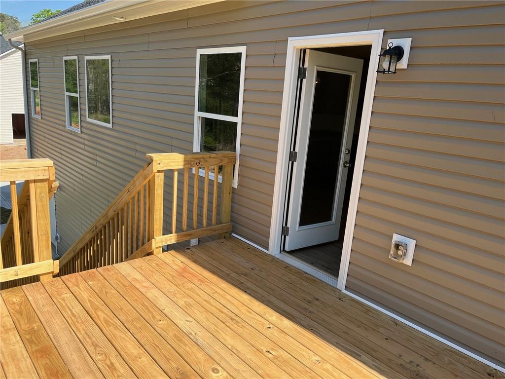 202 Gamel Road Dallas, GA 30157 - Photo 33 of 34 a view of a house with wooden deck