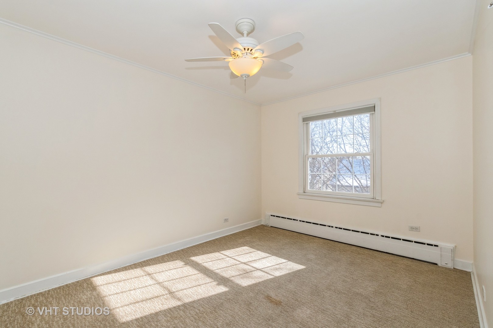 334 Ridge Avenue, Unit 3 Evanston, IL 60202 - Photo 8 of 12 an empty room with a window