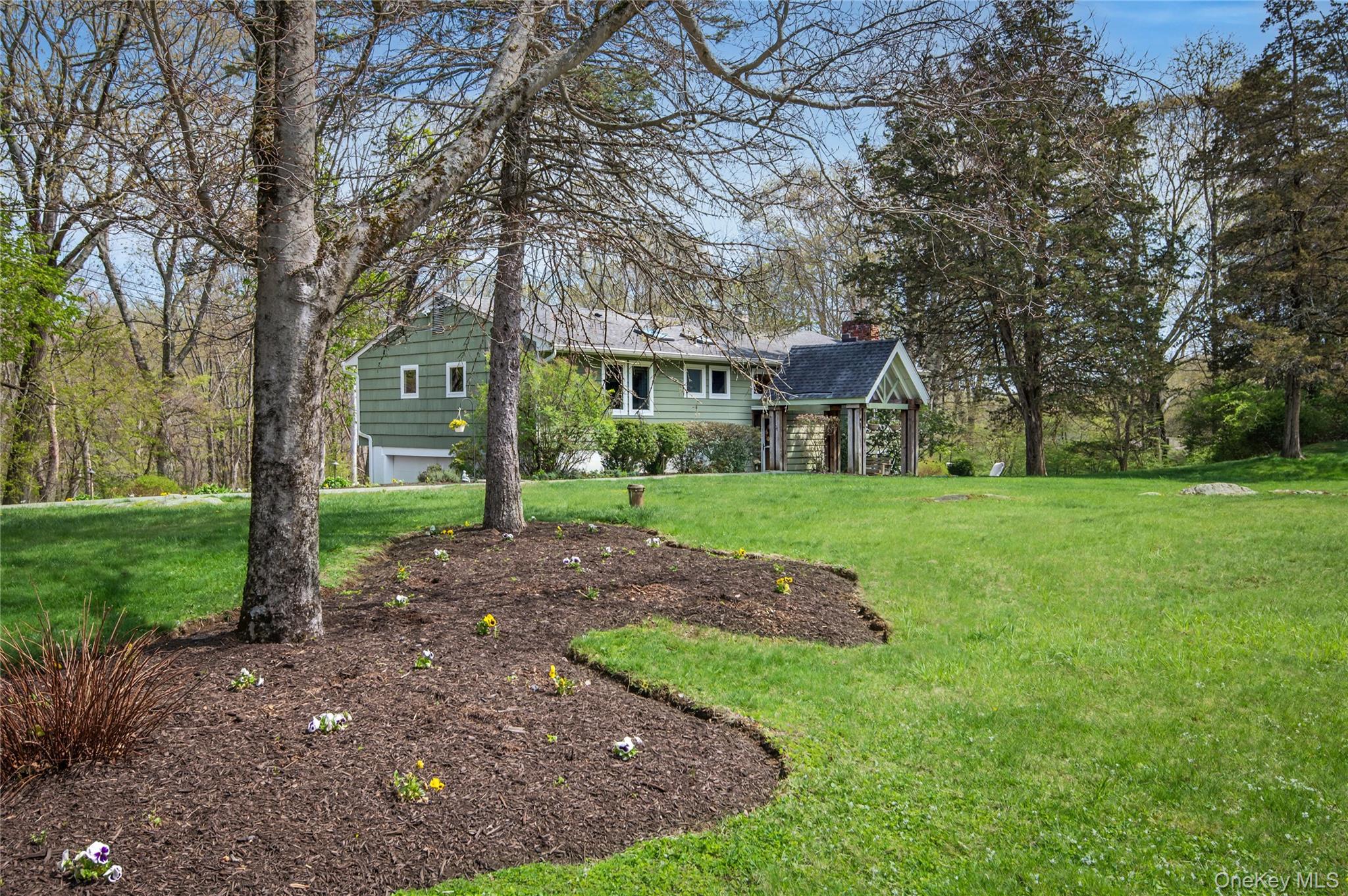 41 Cross Pond Road Pound Ridge, NY 10576 - Photo 41 of 41 a front view of house with yard and green space