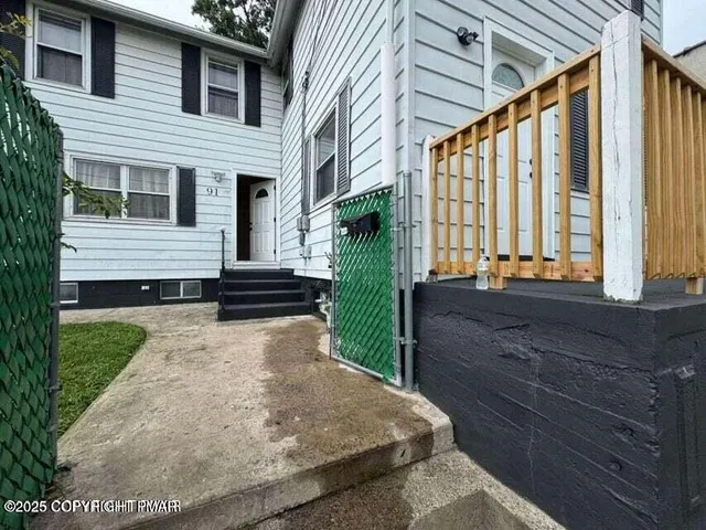 a view of a back yard of the house