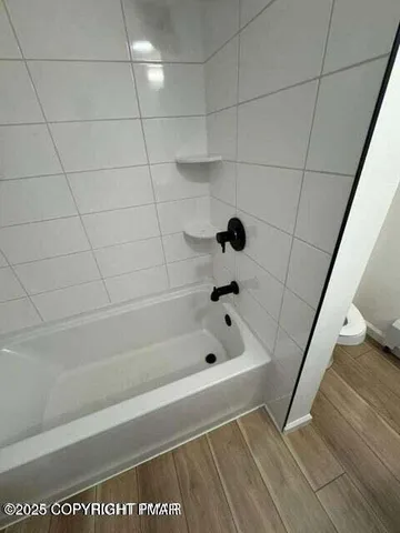 a bathroom with a bathtub