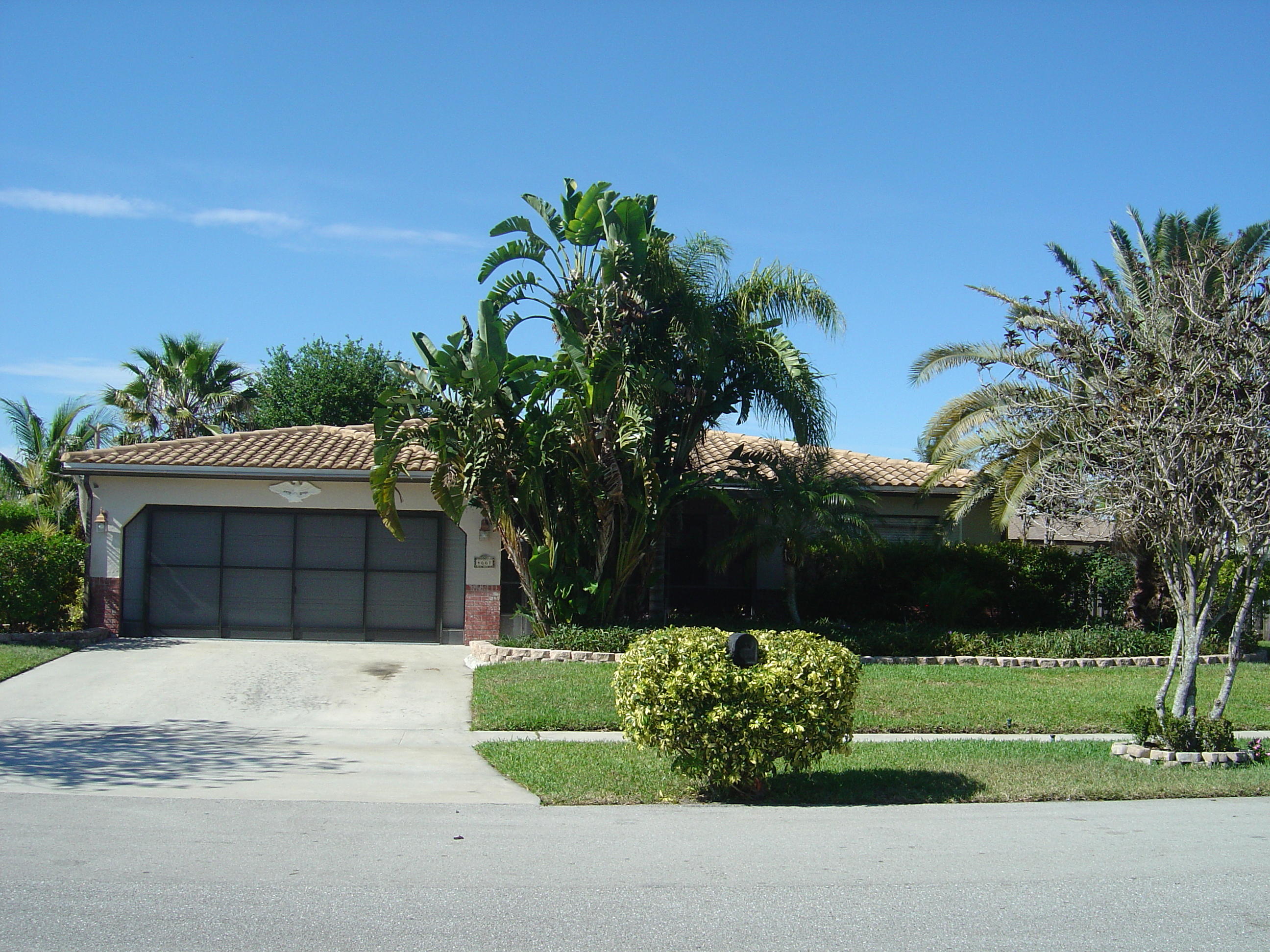 4661 Bison Street Boca Raton, FL 33428 - Photo 1 of 44 FRONT