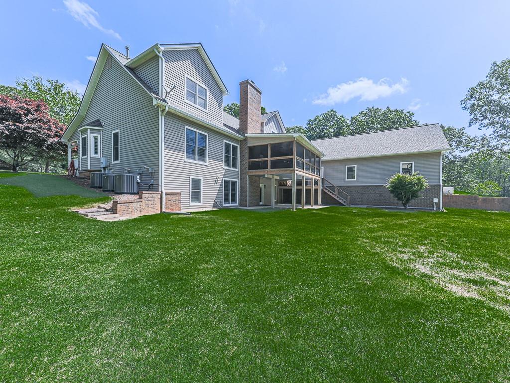 397 Thomas Road Dallas, GA 30132 - Photo 86 of 108 a front view of house with yard and green space