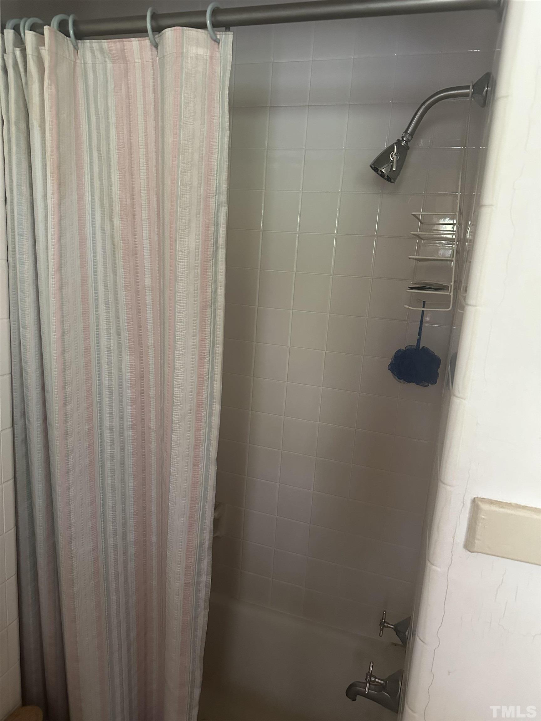 1309 Canterbury Road Raleigh, NC 27607 - Photo 25 of 32 a bathroom with a shower