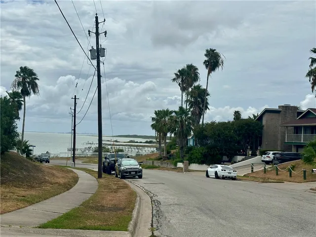 a kitchen with stainless steel appliances a stove a microwave and cabinets