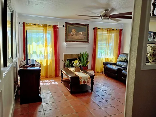 a bedroom with a bed and a mirror