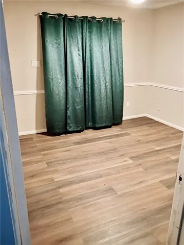 a bath room with a toilet and a shower