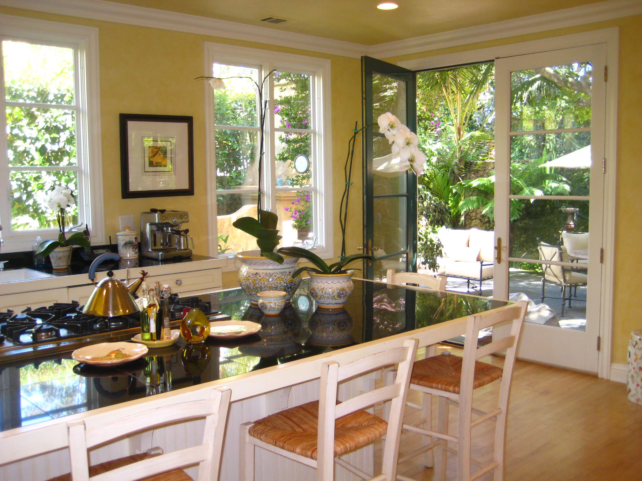76 Depot Road Santa Barbara, CA 93108 - Photo 4 of 12 a living room with large windows and couches