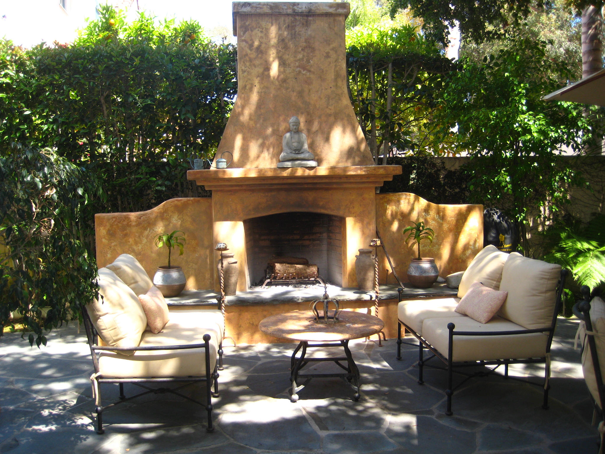 76 Depot Road Santa Barbara, CA 93108 - Photo 8 of 12 a view of patio with table and chairs and potted plants