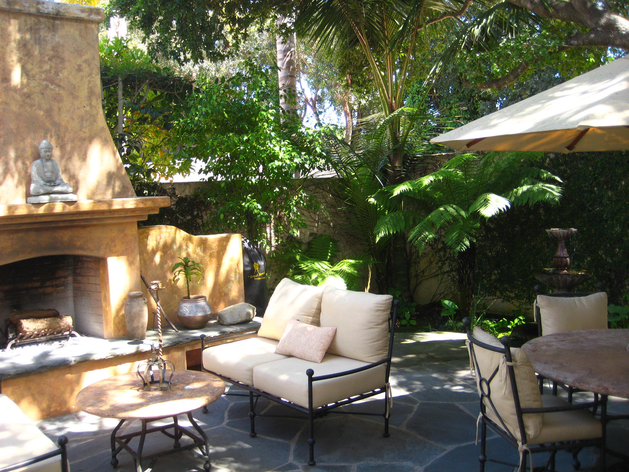 76 Depot Road Santa Barbara, CA 93108 - Photo 9 of 12 a view of a patio with table and chairs and potted plants