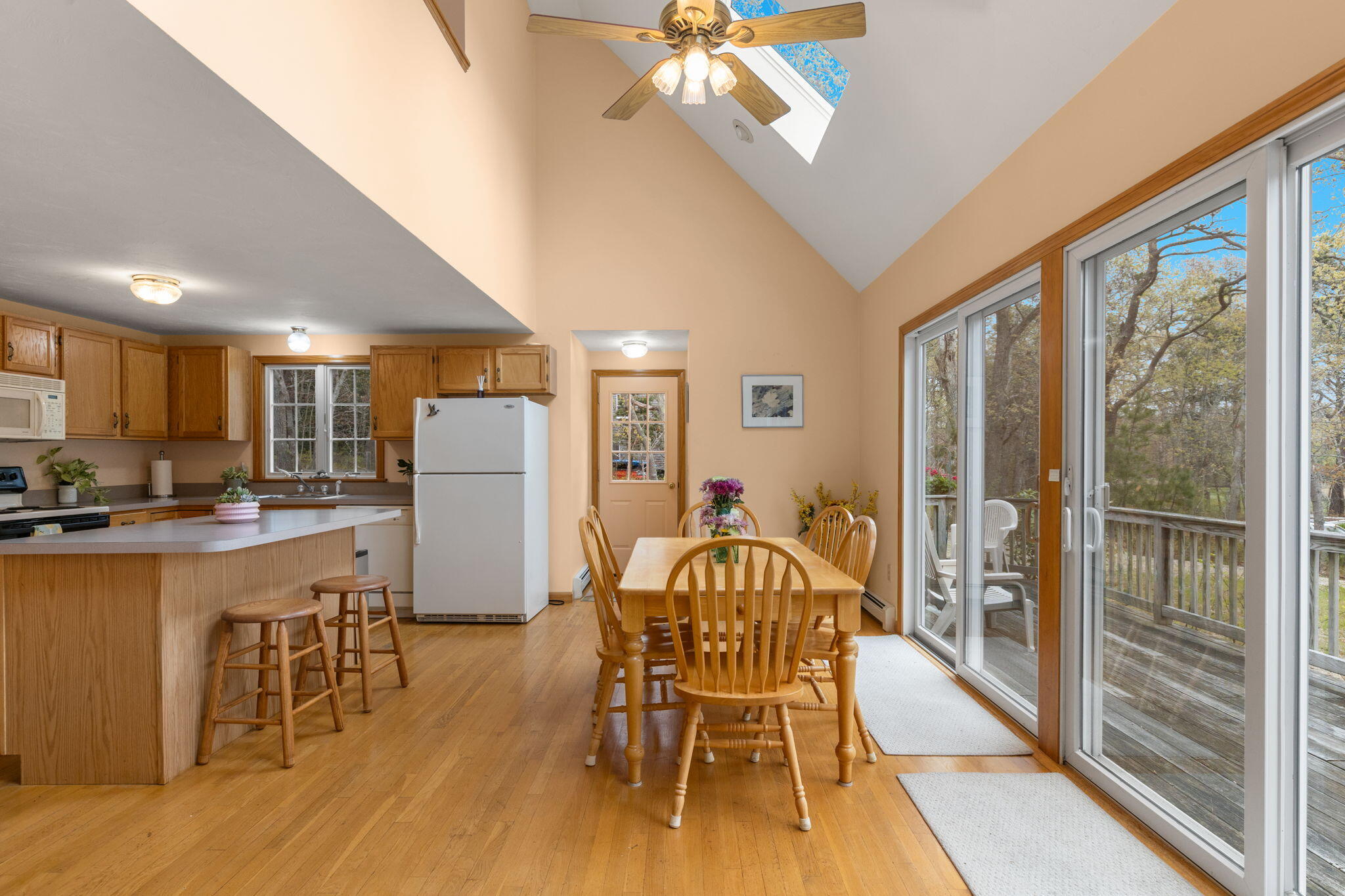 285 Blue Heron Road Wellfleet, MA 02667 - Photo 7 of 31 a view of a dining room with furniture window and wooden floor