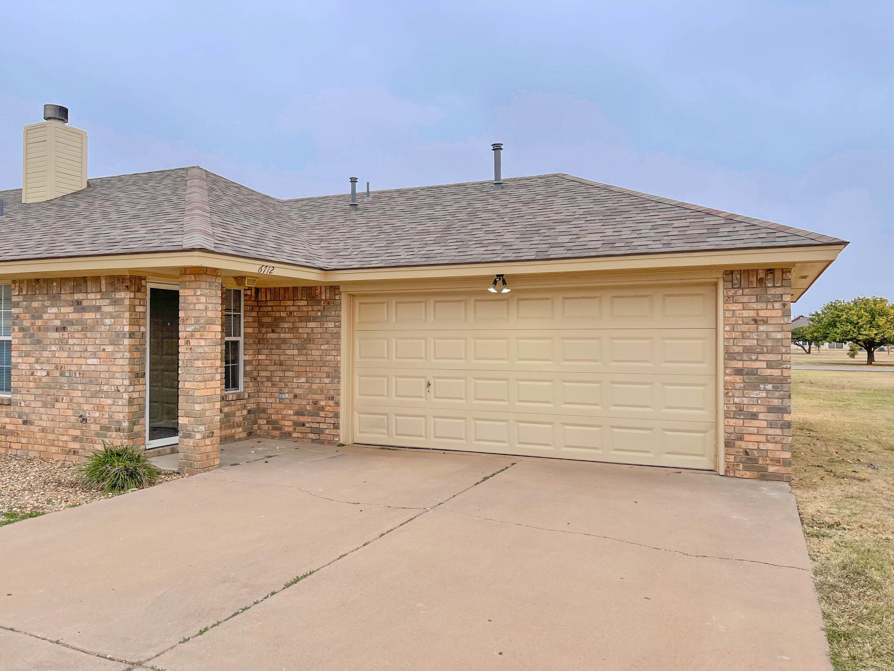 6712 4th Street, Unit B Lubbock, TX 79416 - Photo 1 of 10 IMG_5820-2